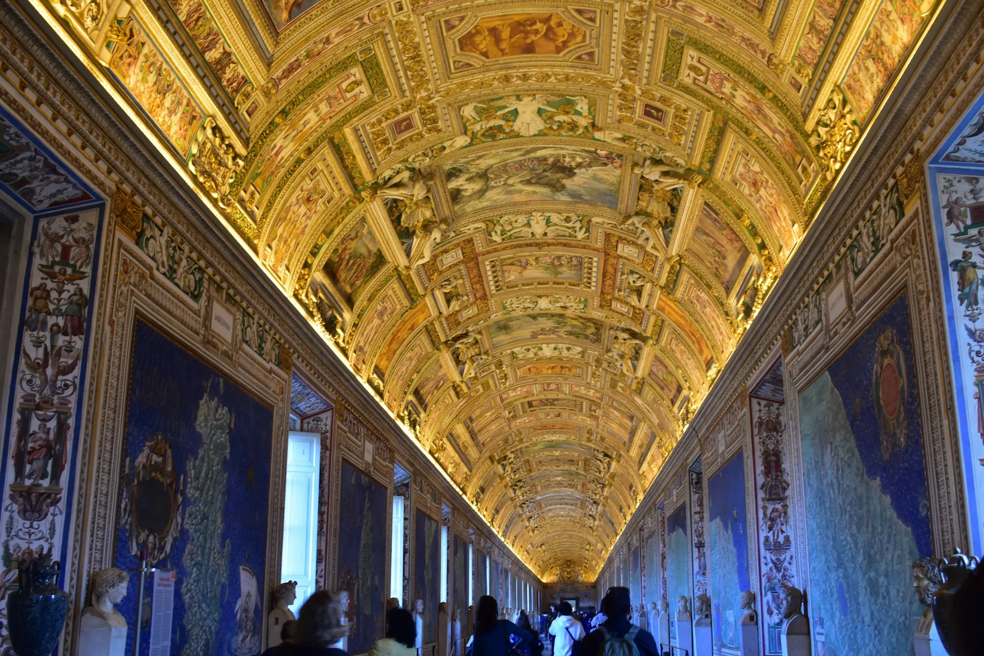 The gilded, frescoed ceiling of the Vatican Museums on the way to the Sistine Chapel